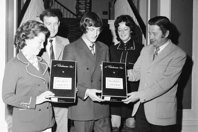 From left, Mrs. Norman O'Hara, Mr. Frank Friel, Mr. Noel McManmon, Mrs. Moya McBride and Mr. Norman O'Hara, with boxes made by Speediprint for Clubman Shirts Ltd.