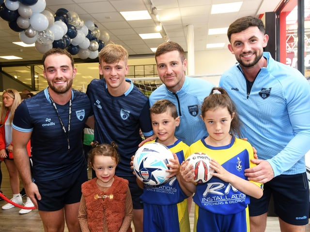 Derry City stars Patrick McEleney and Ciaron Harkin picured with youngsters who enjoyed meeting them at the O'Neills Superstore on Tuesday. Included are Jack O'Donnell and Charlie White, O'Neills staff members.