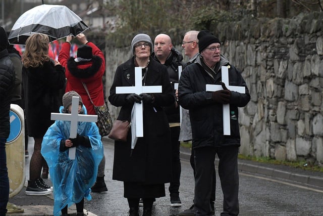 Relatives carry white crosses at the Bloody Sunday 52nd commemoration march on Sunday afternoon. Photo: George Sweeney