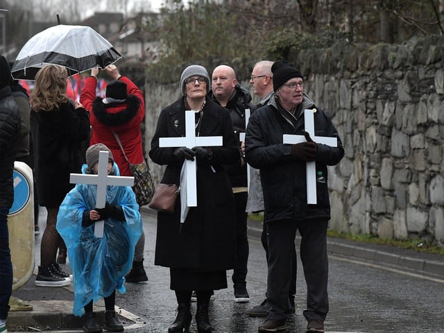 Relatives carry white crosses at the Bloody Sunday 52nd commemoration march on Sunday afternoon. Photo: George Sweeney