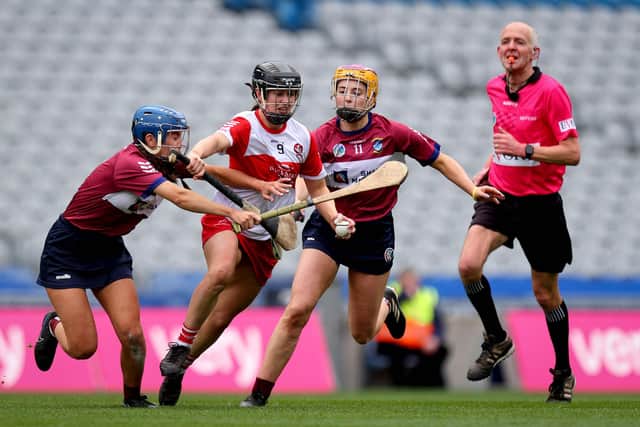 Derry’s Megan Kerr tangles with Jade McKeogh of Westmeath during Sunday's Very Camogie League Division 2A Final in Croke Park. (Photo: INPHO/Ryan Byrne)