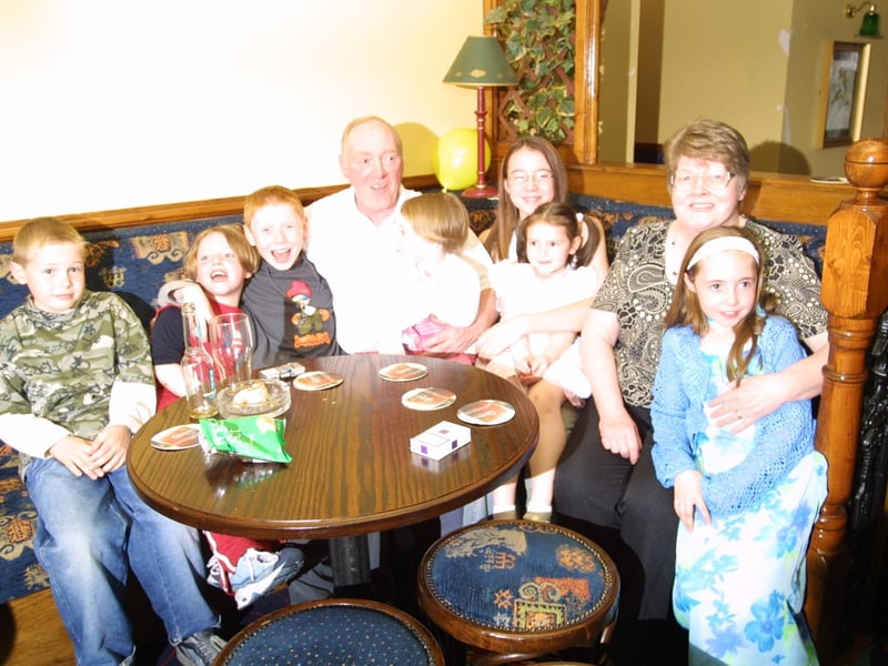 Charlie and Nellie with their grandchildren.