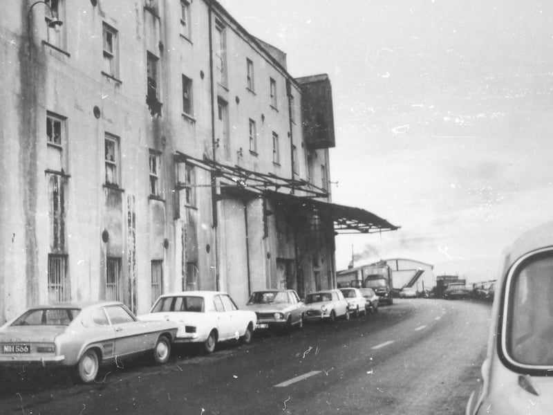 A view of the old quay circa 1970. The large building on the left is the rear entrance to Roulston's Pork Store. The building on the right is the Heysham Shed.