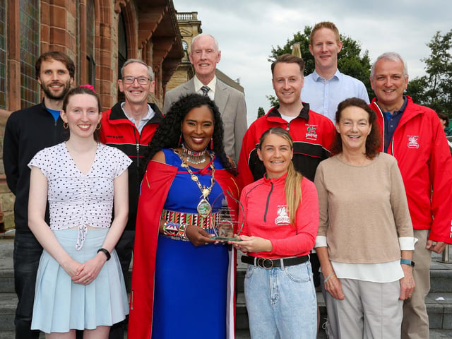 The Mayor of Derry Councillor Lilian Seenoi Barr presenting a civic gift to Gemma Thompson, City of Derry Spartans Athletic Club, at in reception in the Guildhall following her recent success in winning 2 medals at the European Masters Indoor Championships in Poland. Gemma won the medals in the 200m and 60m setting an Irish Record. Included are fellow Spartans.Photo Lorcan Doherty