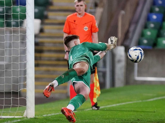 Ardmore keeper Kristian O'Hagan superbly pushes away an Enniskillen penalty during Friday's fonaCAB Craig Stanfield Irish Junior Cup final at Windsor Park. (Photo: IFA)