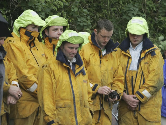 Lough Swilly RNLI members at the Blessing of the Fleet Service at Inch. (0507C05) : Blessing of the Fleet in Inch Island on July 2005.