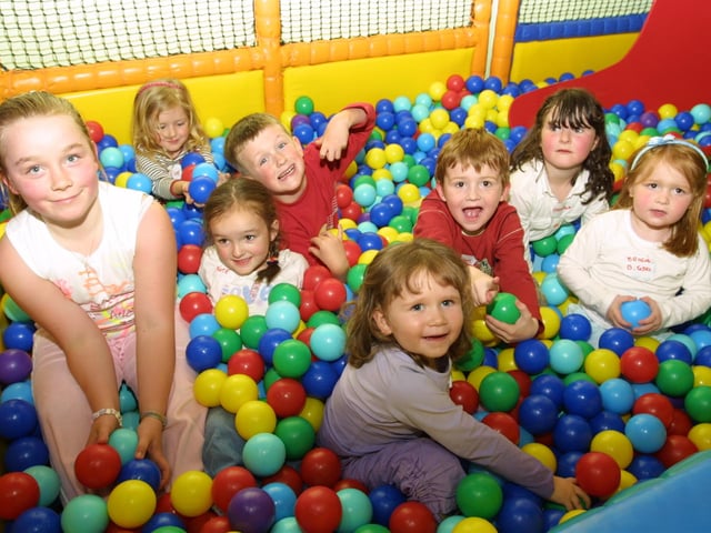 Brogan and her friends having fun in the ball pool