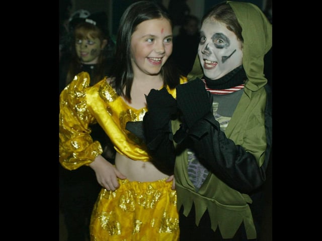 Young people boogying at a Halloween Disco in 2003