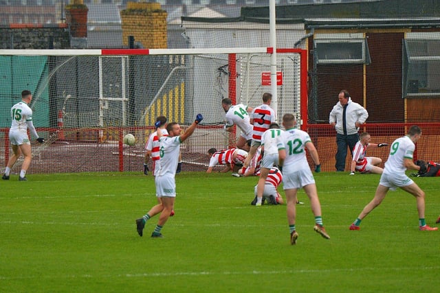 Craigbane’s Lee Moore (14) scores a first half goal against Ballerin in the Junior Football Championship final in Celtic Park on Sunday afternoon last. Photo: George Sweeney.  DER2241GS – 32