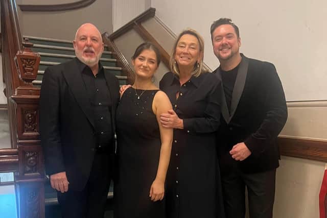 Pictured from the left are John Harkin, Cliodhan Regan inaugural winner of the Derry Feis singing competition sponsored by John, Aisling Bonner, Secretary of Feis Dhoire Cholmcille and Darren Hargan of Les Foyer des Artistes.