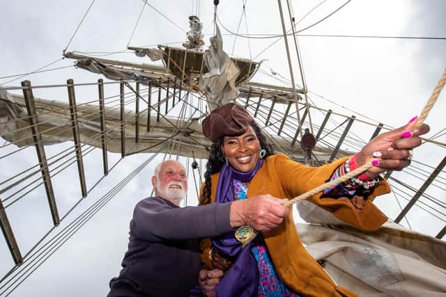 Derry City and Strabane District Council Mayor, Councillor Lilian Seenoi-Barr takes the helm of the Tall Ship, La Malouine with Captain Roy Kerr as the Foyle Maritime Festival begins continuing until Sunday the 30th of June with four days of action packed activities including a spectacular sound and light show on Saturday the 29th.  Picture Martin McKeown. 26.06.24