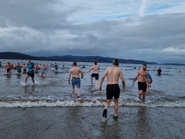 Christmas Day dippers at the annual swim at Ludden beach, Buncrana, County Donegal.
