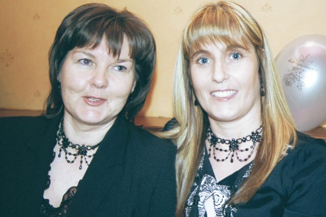 Ann McDonagh pictured with old friend Kitsy McCourt at the Crescent Bar. 160103S15:2003 Party Pics