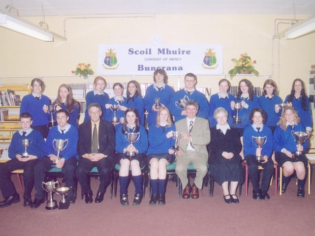 Subject award winners with, seated from left, Frank McHale, Parent's Council, Liam Rainey, principal, and Sister Marie Wylie, Board of Management chairperson. (2005MG03)