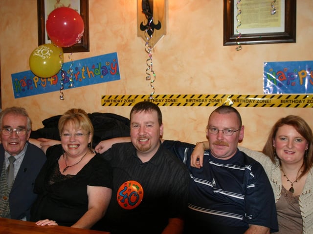 Enjoying the surprise birthdat party in the Don Bar are left to right Peter, Shelia, Christyand Claire. 1198/dd : Parties in December 2005.