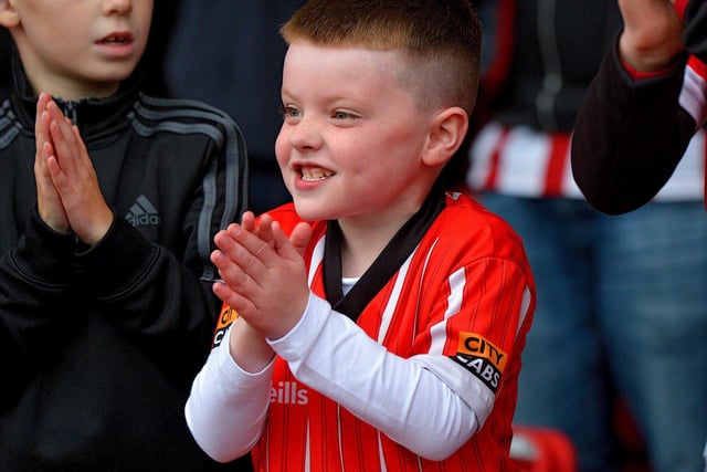 A delighted young Derry City fan at Sunday’s Extra.ie FAI Cup semi-final win over Treaty United. Picture by George Sweeney. DER2241GS – 032