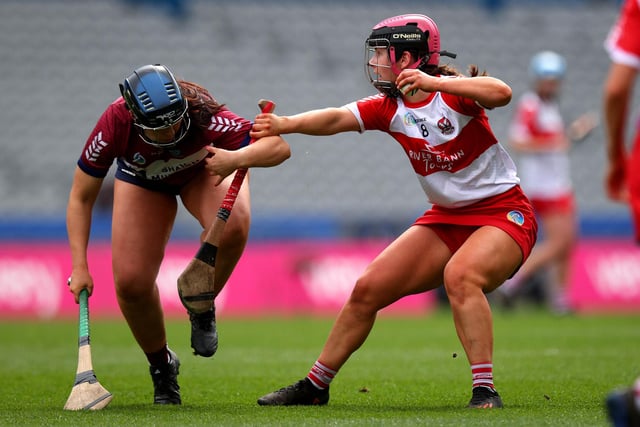 Derry’s Aine McGill and Julie McLoughlin of Westmeath battle for possession during Sunday's Very Camogie League Division 2A Final in Croke Park. (Photo: INPHO/Ryan Byrne)