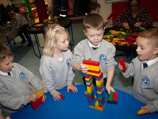 Children from Mrs. McLaughlin's P1 class enjoying play activities at Sacred Heart PS.