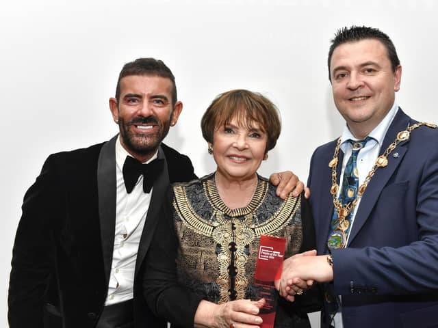 Derry Journal / BetMcLean People of the Year Awards 2025. Winner of the Lifetime Achievement Award sponsored by Derry City & Strabane District Council, Dana Scallon pictured with Event Host Micky Doherty and mayor of Derry and Strabane Ruairi McHugh. Photo: George Sweeney