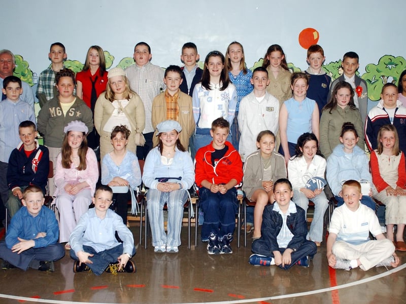 Pupils from Greenhaw Primary School who were confirmed by Most Rev. Dr Francis Lagan, Auxiliary Bishop of Derry, In St Brigid's Church, Carnhill. Included are Mr Paul Sheridan, vice-principal and Mrs Vindi Torney, principal