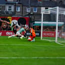 Robbie Benson goes down under the challenge of Bohs' Niall Morahan late in the game at Dalymount Park. Photo: Kevin Moore.