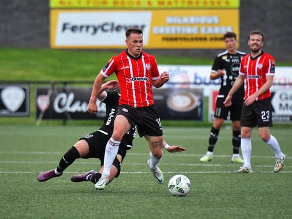 Derry City’s Ben Doherty holds off a tackle from HB Torshavn’s Dan Soylu. Photo: George Sweeney. DER2329GS - 43