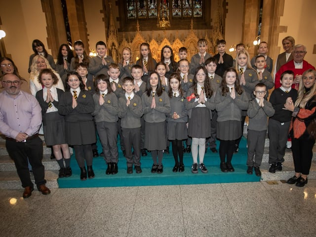 Pupils from Model Primary School who received the Sacrament of Confirmation from Fr. Colum Clerkin at St. Eugene's Cathedral on Thursday last. Included in photo are Mr. Michael Bradley, Vice Principal, Mrs. Catriona Kelly, Mrs. Elisha Smith, Ms. Kate Mellon and Mrs. Julie McCarter, Principal. (Photo: Jim McCafferty Photography)