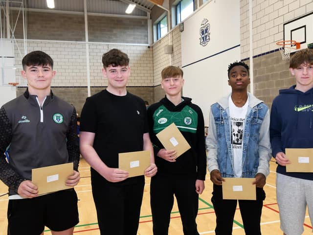 Collecting their GCSE results at St. Columb's College on Thursday morning were, from left, Joseph Bryson, Ethan Bratton, Conor Cooley, Chipulmutso Phiri and Matthew Catterall.
