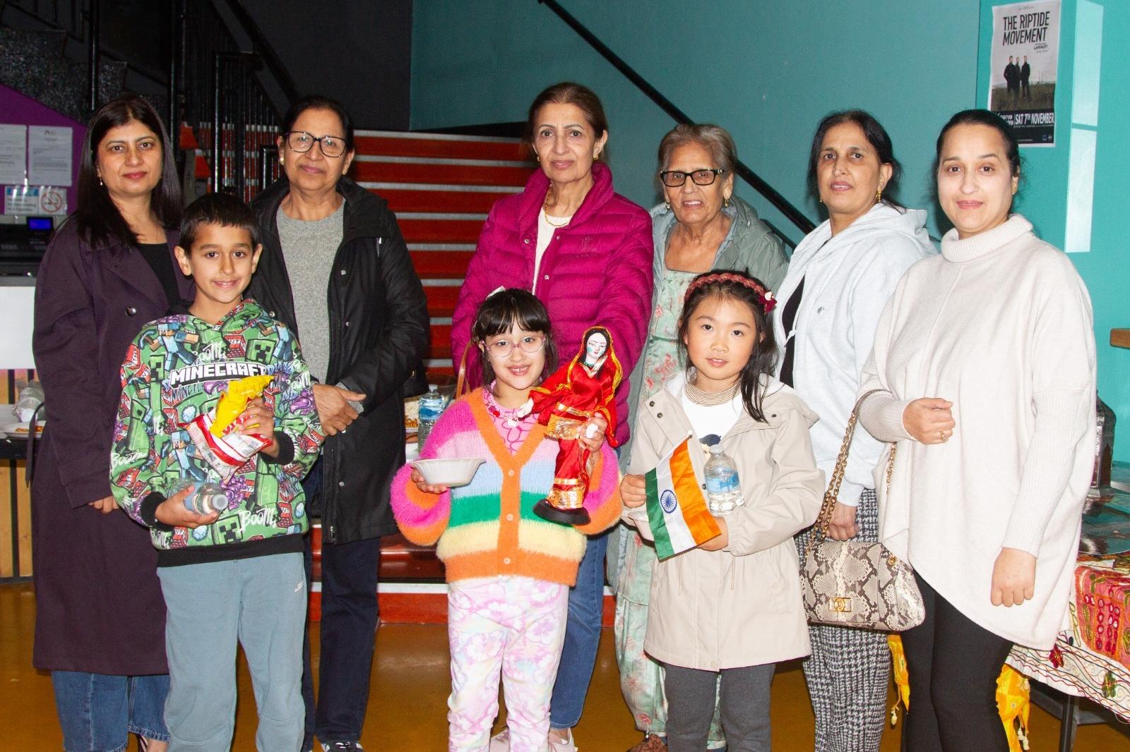 Participants enjoying the Bollywood film screening during Good Relations Week.