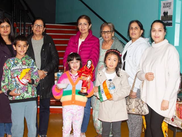 Participants enjoying the Bollywood film screening during Good Relations Week.