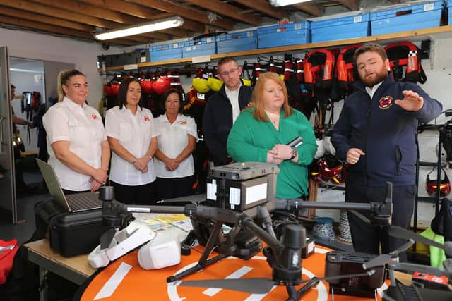 Justice Minister Naomi Long announced funding of £100,000 for Northern Ireland Search and Rescue (NISAR) groups during a visit to Foyle Search and Rescue (FSAR) in Derry. Pictured with Minister Long are Foyle Search and Rescue staff and volunteers.
