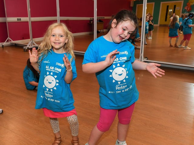 Some of the children from across the community who participated in the week long Good Relations, arts based, Summer Camps held at Studio, supported by Radius Housing Association. Photo: George Sweeney