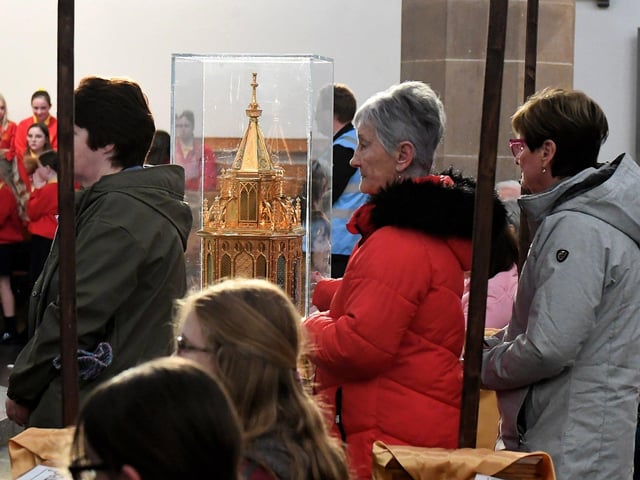 People queue for the veneration of the relics of St Bernadette at St Eugene's Cathedral on Monday morning. Relics of the saint are being taken on pilgrimage to each of the 26 Catholic dioceses in Ireland. Photo: George Sweeney