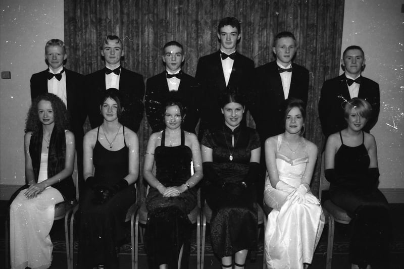 Seated, from left, Charlene McIntyre, Erin McKinney, Corinne McDonagh, Sharon Sweeney, Kathleen Doran and Colleen Stewart. Standing, from left, Ciaran McCarron, Kevin McCole, Connie Martin, Vincent Hegarty, Paddy McGuinness and Stephen Martin, at the St. Brigid's High School Formal in January 1998.