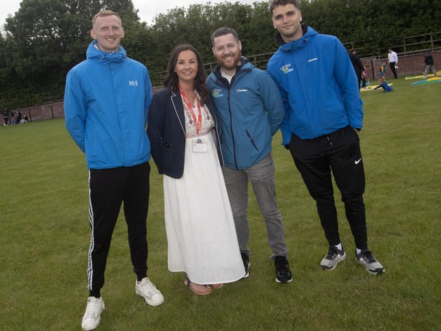 Mrs. Pat Concannon, Principal, Holy Child PS pictured with some of the volunteer helpers from the Creggan Community Centre in Friday evening.
