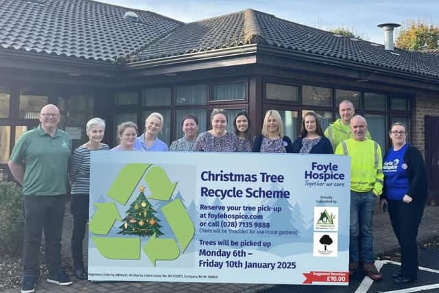 Staff and volunteers launching the Christmas Tree Recycling Scheme.