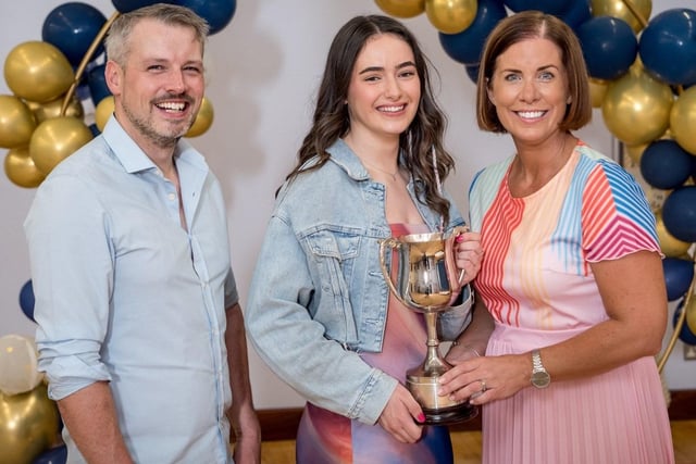 Outstanding Contribution to Sport was presented to Harriet Reid. Also pictured Mr Conor Mc Kinney (Guest speaker) & Mrs Suzanne Deery (Senior Teacher).