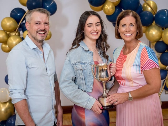 Outstanding Contribution to Sport was presented to Harriet Reid. Also pictured Mr Conor Mc Kinney (Guest speaker) & Mrs Suzanne Deery (Senior Teacher).