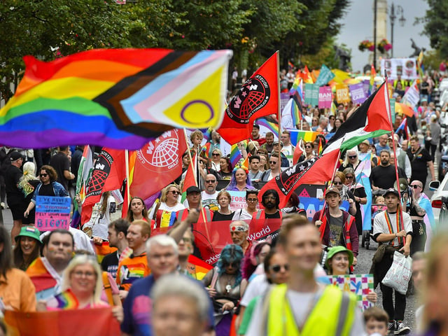 The 2025 Foyle Pride Parade makes its way down Shipquay Street towards Guildhall Square.. Photo: George Sweeney