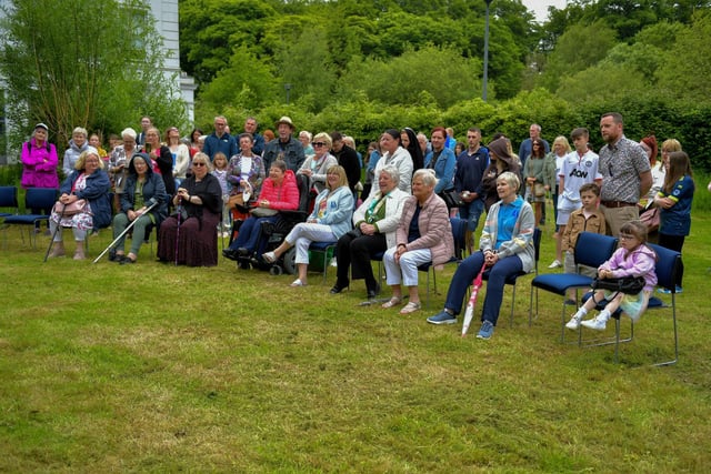 Families from across Northern Ireland and Donegal gather for the unveiling and blessing of Life After’s memorial bench beside St Columb’s Pak House. Photo: George Sweeney. DER2321GS - 163
