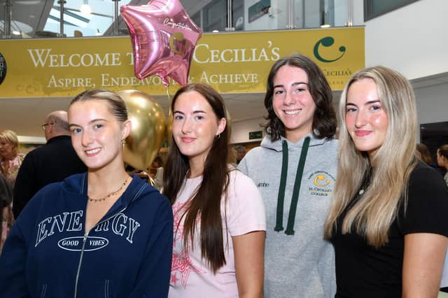 All smiles at St. Cecilia's College on Thursday morning were, from left, Michaela McDowell, Catherine McDowell, Caoimhe Canning and Anna McDowell.