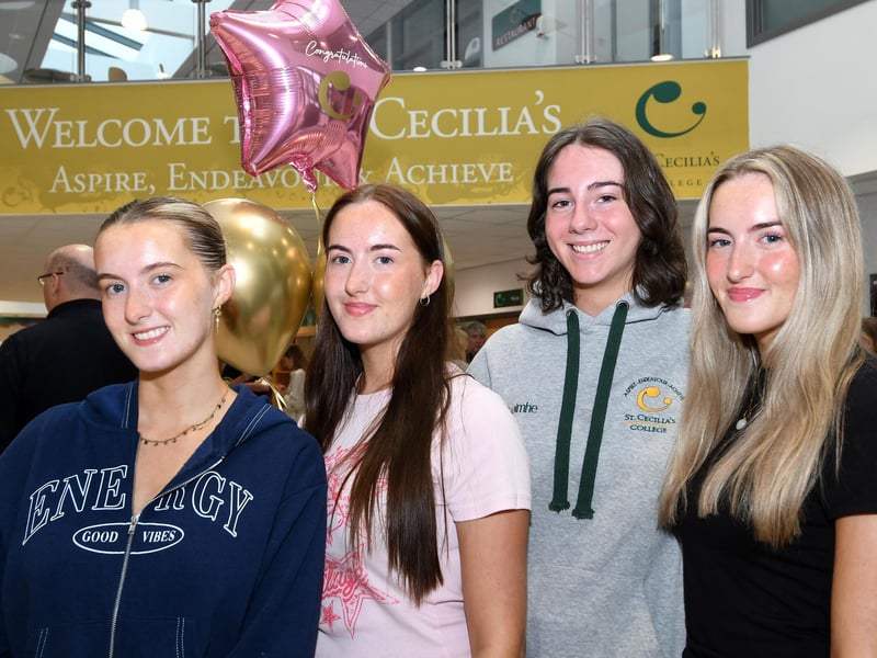 All smiles at St. Cecilia's College on Thursday morning were, from left, Michaela McDowell, Catherine McDowell, Caoimhe Canning and Anna McDowell.
