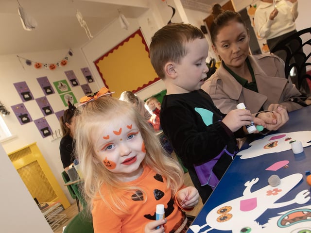 Some of the children at CPTT making their own Halloween decorations.