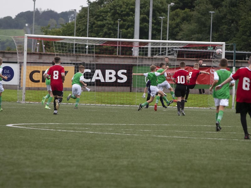 Crusaders Michael Mulholland blasts goalwards against Hibs during Saturday’s u-12 Foyle Cup final at the Brandywell.  (Photos: Jim McCafferty Photography)