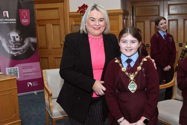 St John's Primary School Pupil, Amelia pictured with Mayor Sandra Duffy during the visit to the Guildhall on Monday.