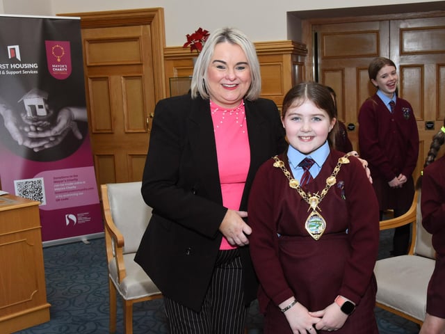 St John's Primary School Pupil, Amelia pictured with Mayor Sandra Duffy during the visit to the Guildhall on Monday.