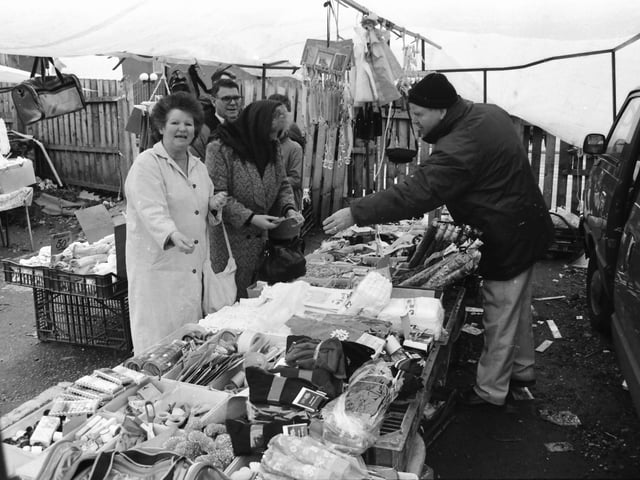 A brisk trade underway at the Foyle Street market.