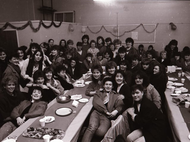 Young people enjoying a Christmas party back in 1985.
