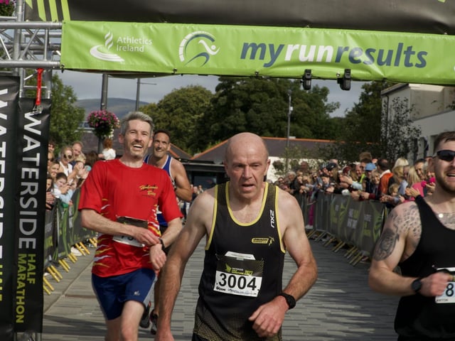 These runners are pictured crossing the finishing line at Ebrington after a terrific effort at the 40th running of the Waterside Half Marathon.