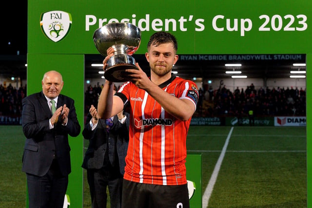 Derry City captain Will Patching with the President’s Cup after their victory over Shamrock Rovers at the Brandywell on Friday evening. Photo: George Sweeney. DER2307GS – 84